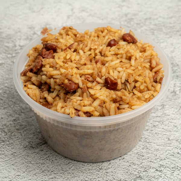 Angie's Soul House rice and beans in a clear plastic container.